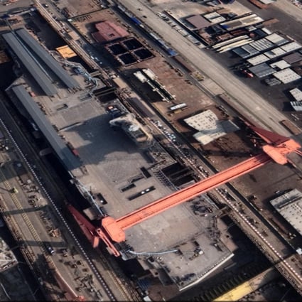 Recent satellite imagery shows construction work on the aircraft carrier has almost been completed. Photo: Google Earth