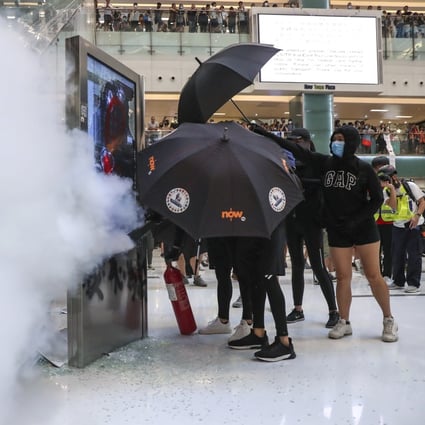 Protesters destroy MTR facilities at New Town Plaza in Sha Tin in 2019. Photo: Sam Tsang