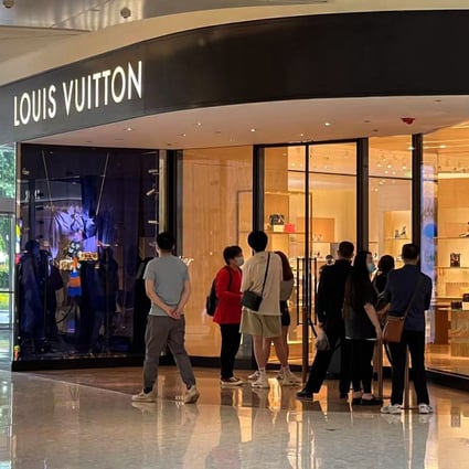 Shanghai residents are seen lining up outside a Louis Vuitton boutique inside Sun Hung Kai Properties’ Shanghai IFC mall on June 1, 2022. Photo: Handout