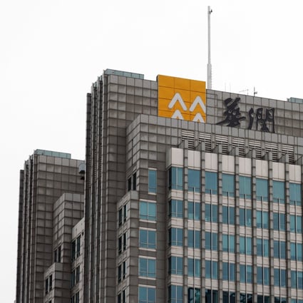 The logo of China Resources (Holdings) is seen on the facade of its building in Beijing. Photo: Reuters