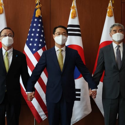 Kim Gunn, South Korea’s new special representative for Korean Peninsula peace and security affairs, his US counterpart Sung Kim and Japanese counterpart Takehiro Funakoshi pose before their meeting at the Foreign Ministry in Seoul. Photo: AFP
