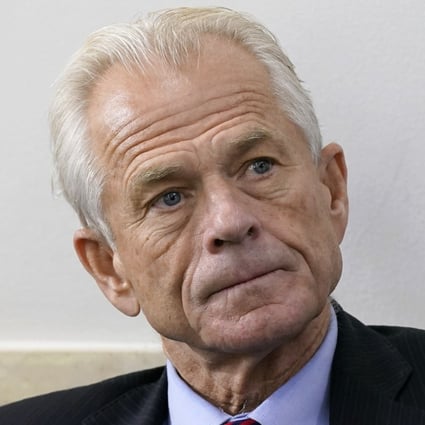 White House trade adviser Peter Navarro listens as President Donald Trump speaks during a news conference at the White House in August 2020. Photo: AP