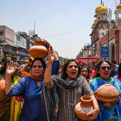 Women activists of Bharatiya Janata Party (BJP) during a protest march against Aam Aadmi Party (AAP) in New Delhi, India on Friday. Photo: AFP