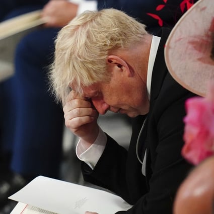 Britain’s Prime Minister Boris Johnson was jeered by the public when he arrived at a service of thanksgiving for Queen Elizabeth on Friday. Photo: AP