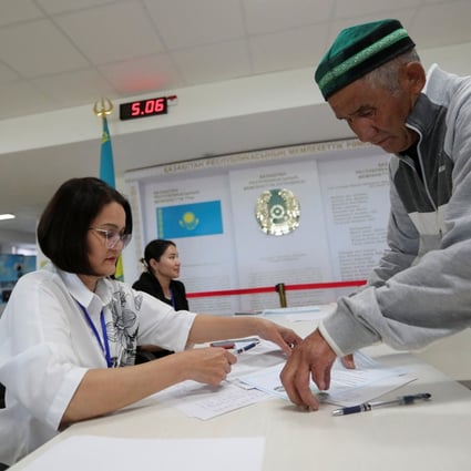 A man prepares to cast his ballot at a polling station during a constitutional referendum, in Koyandy, Akmola region, Kazakhstan, on Sunday. Photo: Reuters
