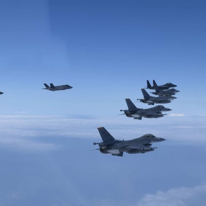 South Korean warplanes, including F-35 stealth fighters, and US F-16 jets flying in tactical formation in airspace over South Korea. Photo: AFP