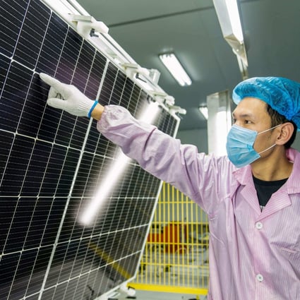 An inspection of solar photovoltaic modules used for small solar panels at a factory in Haian in Jiangsu province. The US has kept tariffs on solar panel imports from China, the global leader in their production. Photo: AFP