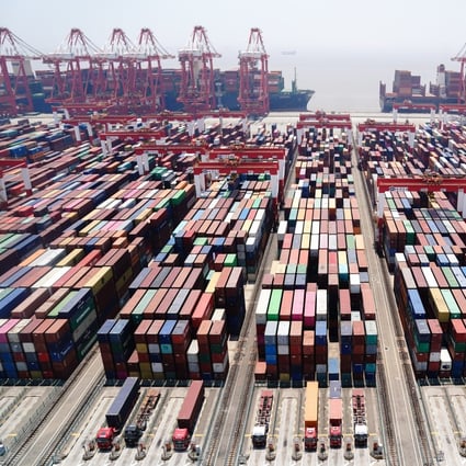 The average waiting time for a container vessel is now 31 hours at the Shanghai Port, down from a peak of 69 hours in late April. Photo: Xinhua