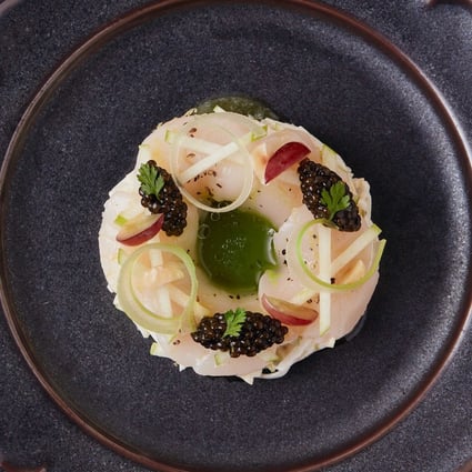 Hokkaido scallops with green celery and apples at Margo in Hong Kong offers a modern German twist that “creates a bridge between the familiar and unfamiliar”. Photo: Margo