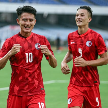 Wong Wei (left) celebrates after putting Hong Kong ahead in the first half. Matthew Orr (right) bagged a second minutes later in their side’s 2-1 win over Afghanistan at the Vivekananda Yuba Bharati Krirangan Stadium in Kolkata. Photo: HKFA