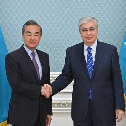 Chinese Foreign Minister Wang Yi (left) with Kazakh President Kassym-Jomart Tokayev, in Nur-Sultan on Tuesday. Photo: Handout