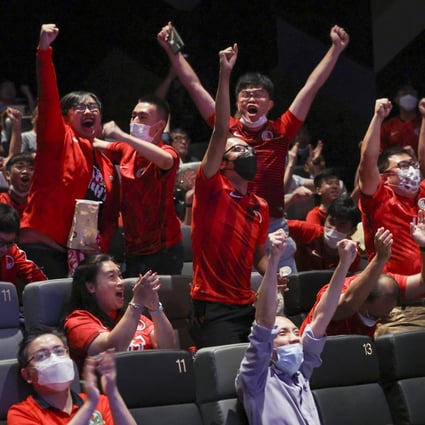 Hong Kong football fans cheer as they watch a game against Afghanistan at Emperor Cinema, Times Square. 
08JUN22     SCMP/Yik Yeung-man