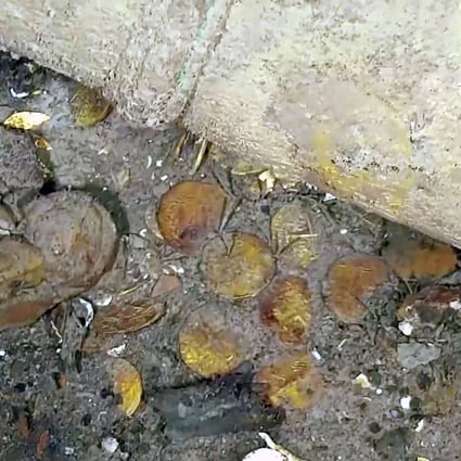 A screen grab of a video released by the Colombian Presidency shows what appears to be gold pieces. Photo: AFP