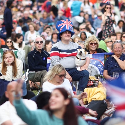 People gather on The Mall ahead of a concert outside Buckingham Palace during Queen Elizabeth’s Platinum Jubilee celebrations in London on June 4. Photo: Reuters
