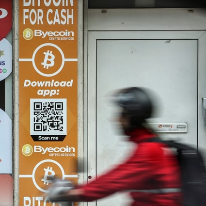 Bitcoin and the Byecoin app are advertised in the window of a store in Antwerp, Belgium. Despite ECB President Christine Lagarde’s view that cryptocurrencies are “worth nothing”, digital assets continue to hold considerable appeal for many. Photo: Bloomberg 
