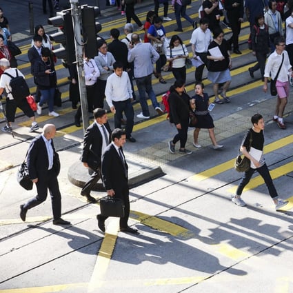General photo of commuters walking in Central. Photo: Felix Wong