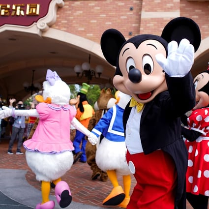 In this file photo from May 2020, Disney characters greet visitors at Shanghai Disney Resort after it reopened following a shutdown due to Covid-19. Photo: Reuters