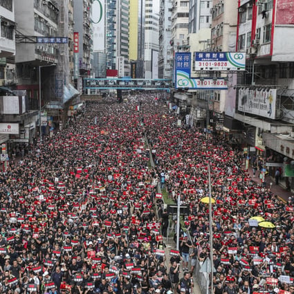 Protesters flood East Point Road in Causeway Bay in a 2019 march to government offices in Tamar, calling on Carrie Lam to resign over the extradition bill crisis. Photo: Sam Tsang