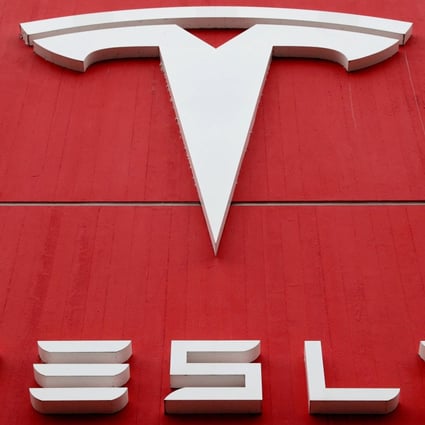 The logo of electric car manufacturer Tesla seen at a branch office in Bern, Switzerland, on October 28, 2020. Photo: Reuters