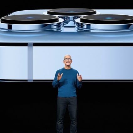 Apple CEO Tim Cook showcases the advanced camera system on the new iPhone 13 Pro in September 2021. Photo: Apple Inc/ AFP