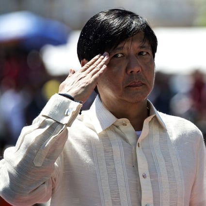 President-elect Ferdinand “Bongbong” Marcos Jnr, son of the late dictator Ferdinand Marcos, salutes as he visits a monument to remember his father. File photo: AFP 