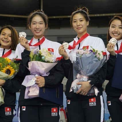 A delighted Hong Kong epee team in the medal ceremony. From Left: Coco Lin, Vivian Kong, Natalie Chan and Moonie Chu. Photo: FIE
