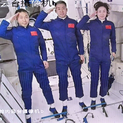 Left to right, Chinese astronauts Cai Zuzhe, Chen Dong and Liu Yang in the space station core module Tianhe this month. Photo: Xinhua