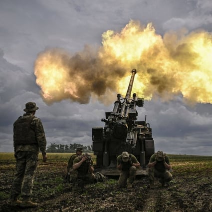 Ukrainian servicemen fire a French self-propelled Caesar howitzer towards Russian positions from the Donbas region on Wednesday. Photo: AFP
