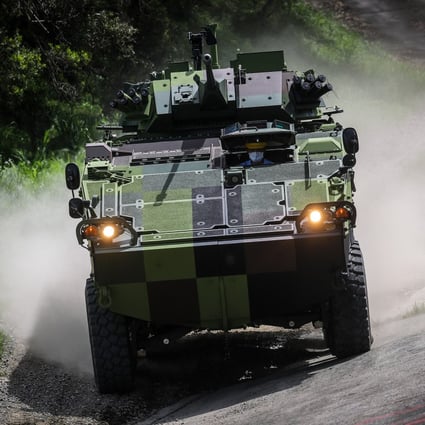 Taiwan’s CM-34 armoured vehicle manoeuvres during a demonstration inside a military testing facility in Nantou county, central Taiwan. Photo: EPA-EFE