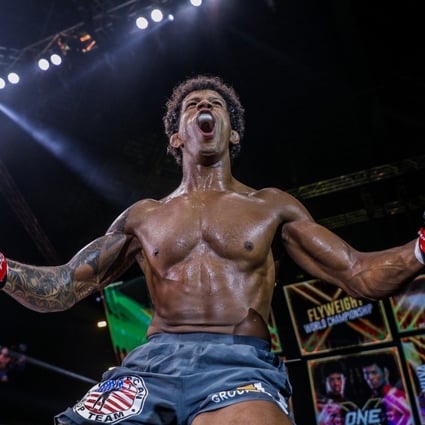 Adriano Moraes celebrates on top of the cage after beating Yuya Wakamatsu. Photos: ONE Championship.