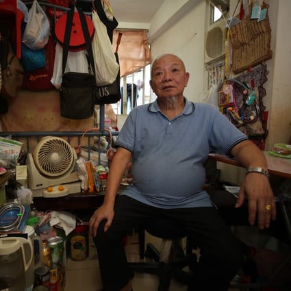 Chan Chuen-bui, 71, in his  subdivided flat in Sham Shui Po. Photo: Edmond So
