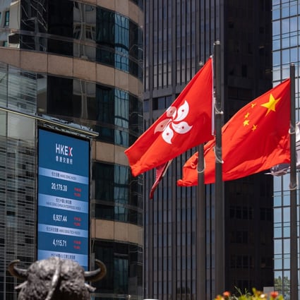 An electronic board displays the latest stock transactions outside Exchange Square in Central,  Hong Kong in May 2022. Photo: EPA-EFE