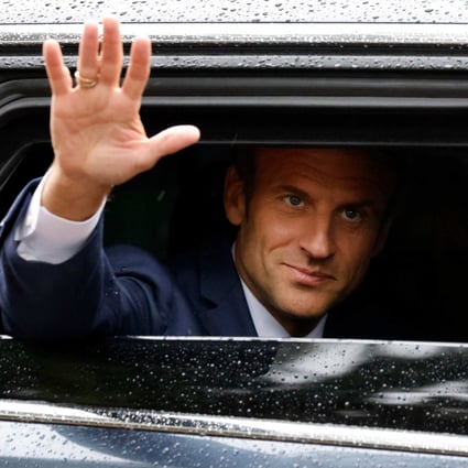 France’s President Emmanuel Macron after casting his vote. Photo: AFP