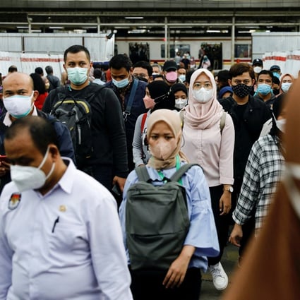 People at a train station during the afternoon rush hour in Jakarta. Photo: Reuters