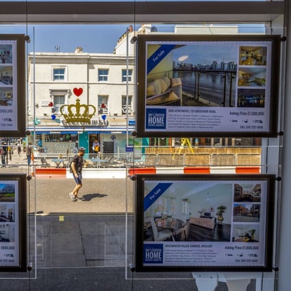 An estate agents’ office in London. Investors can expect home prices in the UK to moderate to single-digit growth by the end of the year, Knight Frank says. Photo: Bloomberg