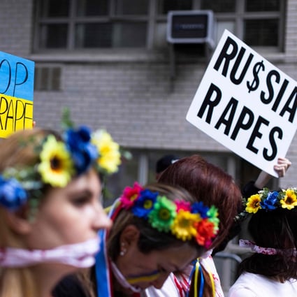 Activists protest rape during war and gather to support Ukraine in front of the Russian Consulate in New York in May. Photo: AFP