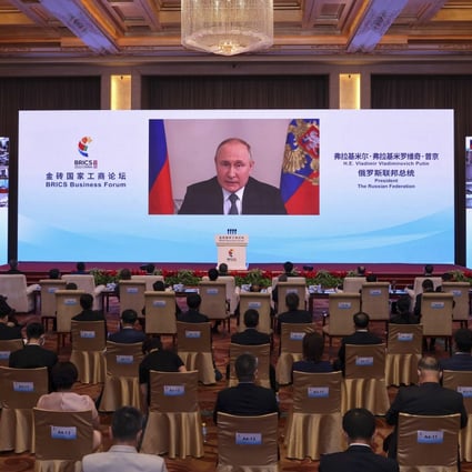 Russian President Vladimir Putin delivers a keynote speech at the BRICS Business Forum in Beijing. Photo: Xinhua