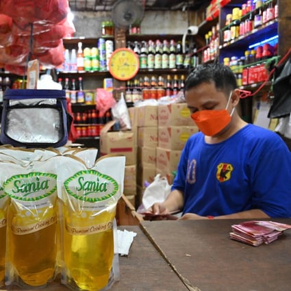 Packages of cooking oil are displayed at a shop in Jakarta. Photo: AFP 