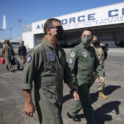 US Indo-Pacific Commander John C Aquilino, left, arriving at Clark Air Base in the Philippines in March. Photo: AP