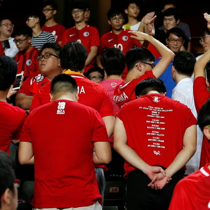 Hong Kong fans turn their backs during the Chinese national anthem before the Asian Cup match against Malaysia in Hong Kong,  in 2017. Photo: Reuters