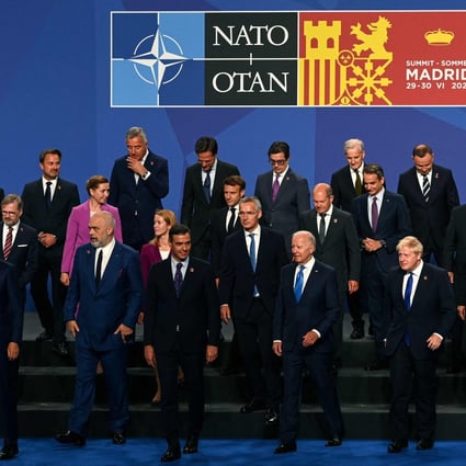 US President Joe Biden (front row) and other leaders depart after posing for the official group photograph during the Nato summit in Madrid on Wednesday. Photo: AFP