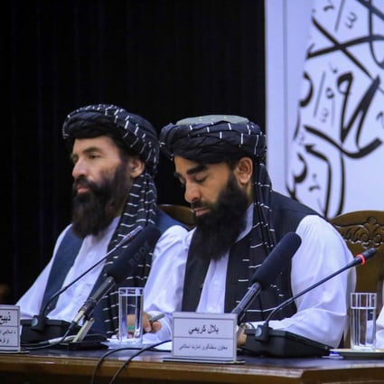 Taliban spokesmen talk to journalists as they brief them about the Loya Jirgas assembly in Kabul, Afghanistan on Thursday. Photo: EPA-EFE