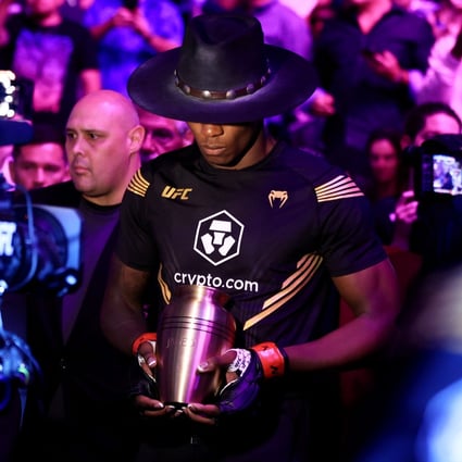 Israel Adesanya heads to the Octagon for his middleweight title bout against Jared Cannonier at UFC 276. Photo: AFP