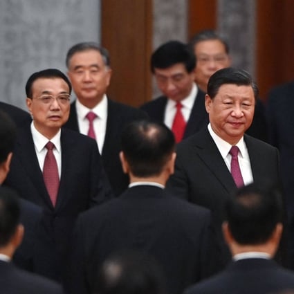 President Xi Jinping (right) arrives with Premier Li Keqiang (left) and members of the Politburo Standing Committee for a reception at the Great Hall of the People on September 30, 2021. A new leadership team will be announced at the party congress in the second half of 2022. Photo: AFP