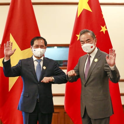 Chinese State Councillor and Foreign Minister Wang Yi, right, meets Vietnamese Foreign Minister Bui Thanh Son on the sidelines of the seventh Lancang-Mekong Cooperation (LMC) foreign ministers’ meeting in Bagan, Myanmar, on July 4, 2022. Photo: Xinhua