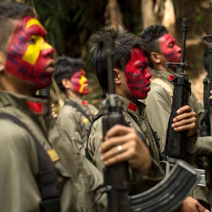 Guerrillas of the New People’s Army at the Sierra Madre mountain range, east of Manila. File photo: AFP