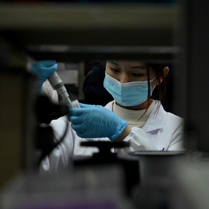 A laboratory technician works at a Tsinghua University lab in Beijing. Brii, Tsinghua University and the Third People’s Hospital of Shenzhen have co-developed a monoclonal neutralising antibody therapy. Photo: AFP