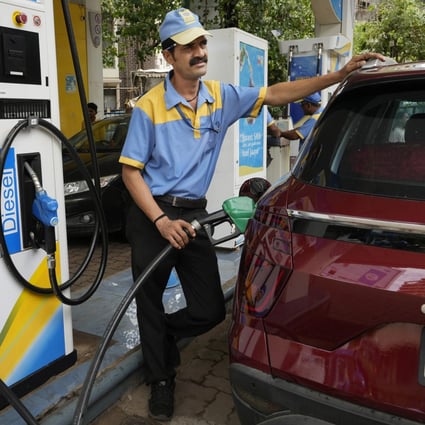 A Bharat Petroleum employee fills up a vehicle at a petrol station in Mumbai on June 11. India and other Asian nations are becoming an increasingly vital source of oil revenue for Moscow as the US and other Western countries cut their energy imports from Russia in line with sanctions over its war in Ukraine. Photo: AP