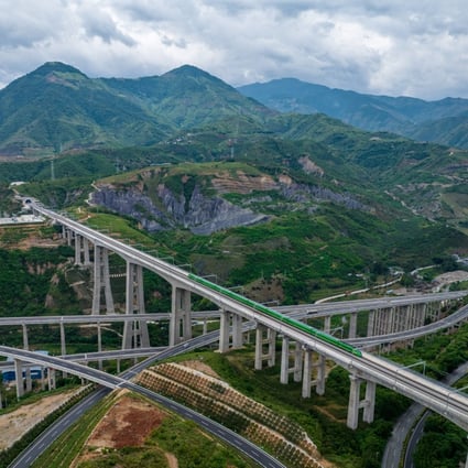 A Fuxing bullet train crosses the Nanxihe grand bridge on the China-Laos Railway in southwest China’s Yunnan province on June 2. China’s strength in high-speed rail construction would make it difficult for the US to compete in infrastructure funding in this area internationally. Photo: Xinhua