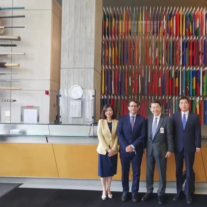 Members of the delegation from Beijing-based think tank the Centre for China and Globalisation meet the World Bank Prospects Group’s chief economist Ayhan Kose (second from left) at the bank’s headquarters in Washington. Photo: Twitter